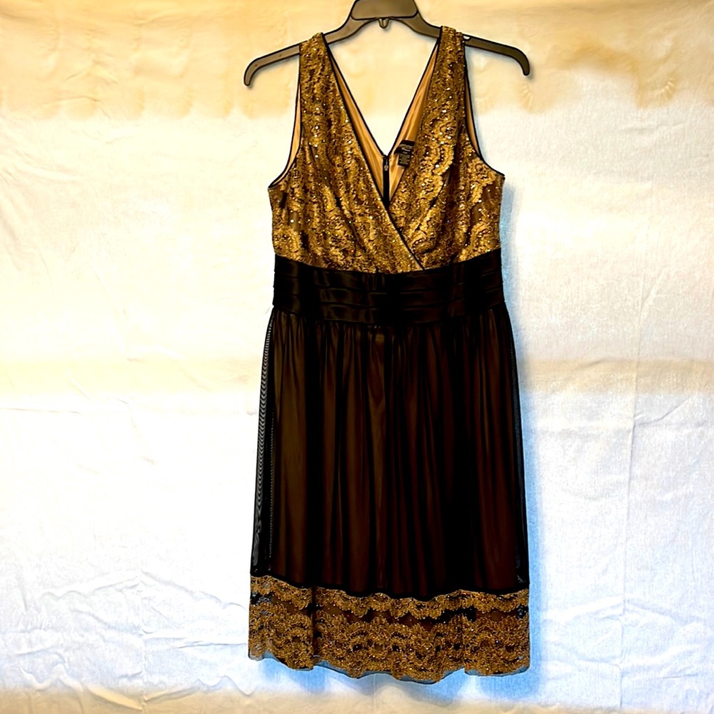 Lovely sequined cocktail dress. Diamond multi colored sequins on black lace.
